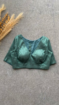 Bottle green silk V neck patterned blouse