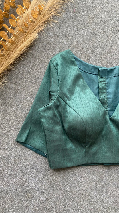 Bottle green silk V neck patterned blouse