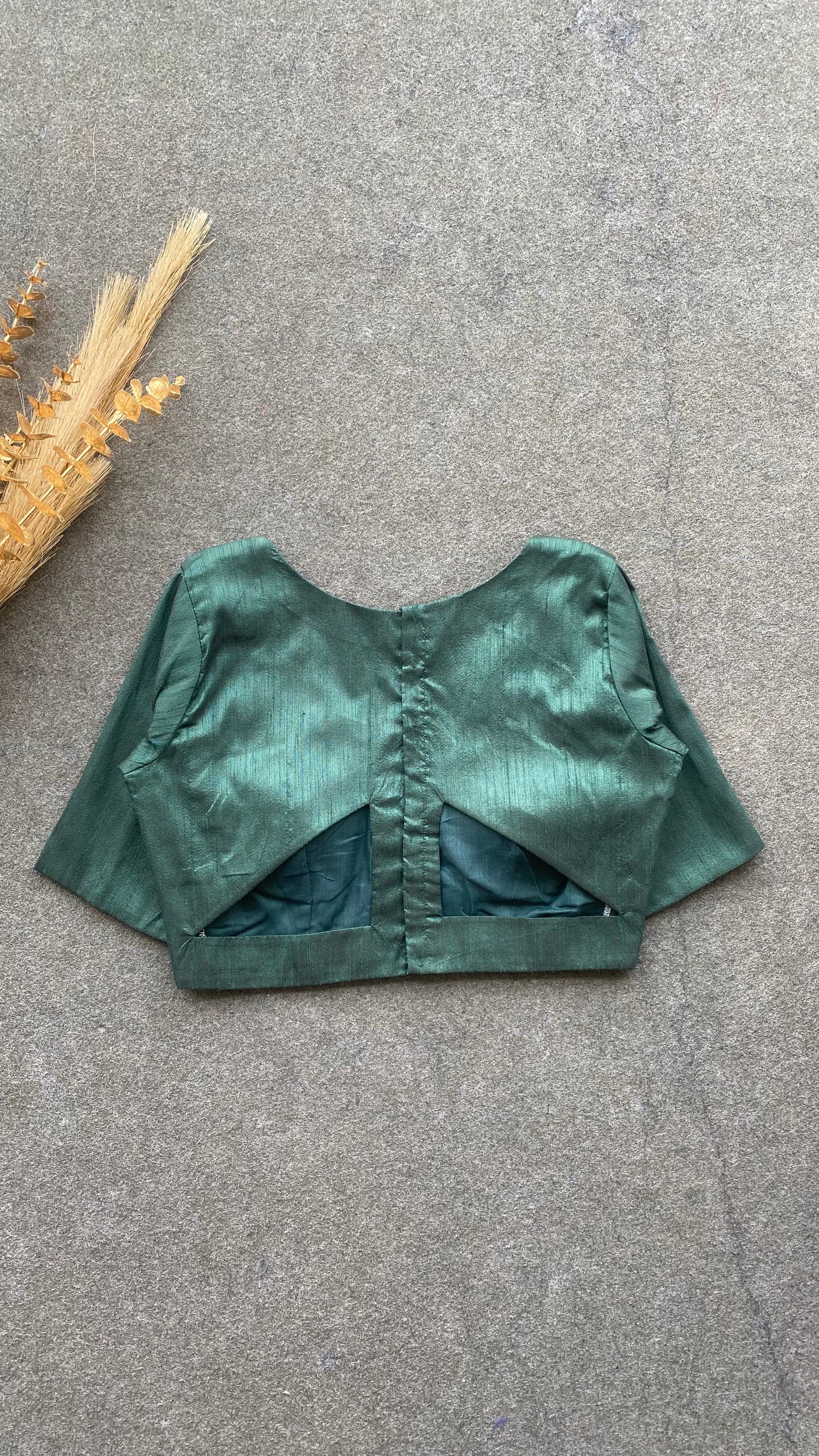 Bottle green silk V neck patterned blouse