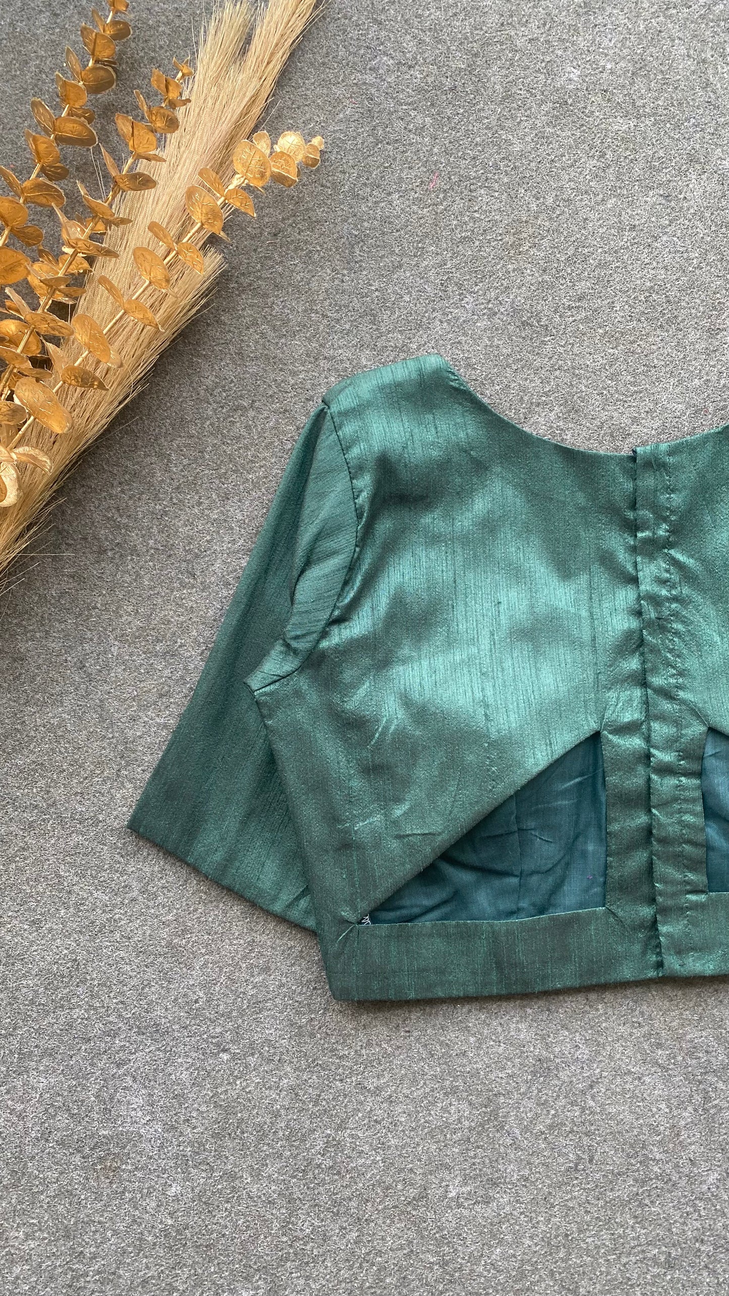 Bottle green silk V neck patterned blouse