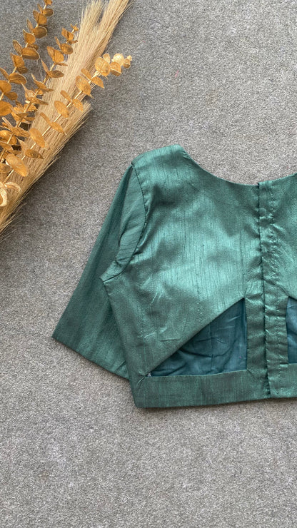 Bottle green silk V neck patterned blouse