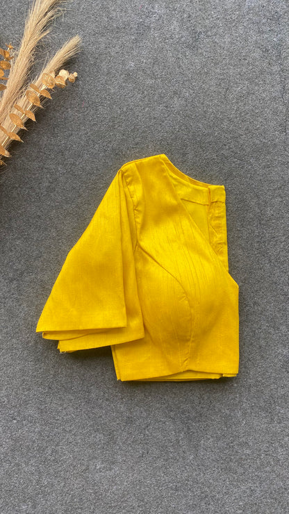 Yellow silk V neck patterned blouse