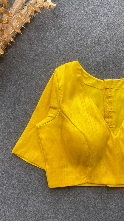 Yellow silk V neck patterned blouse