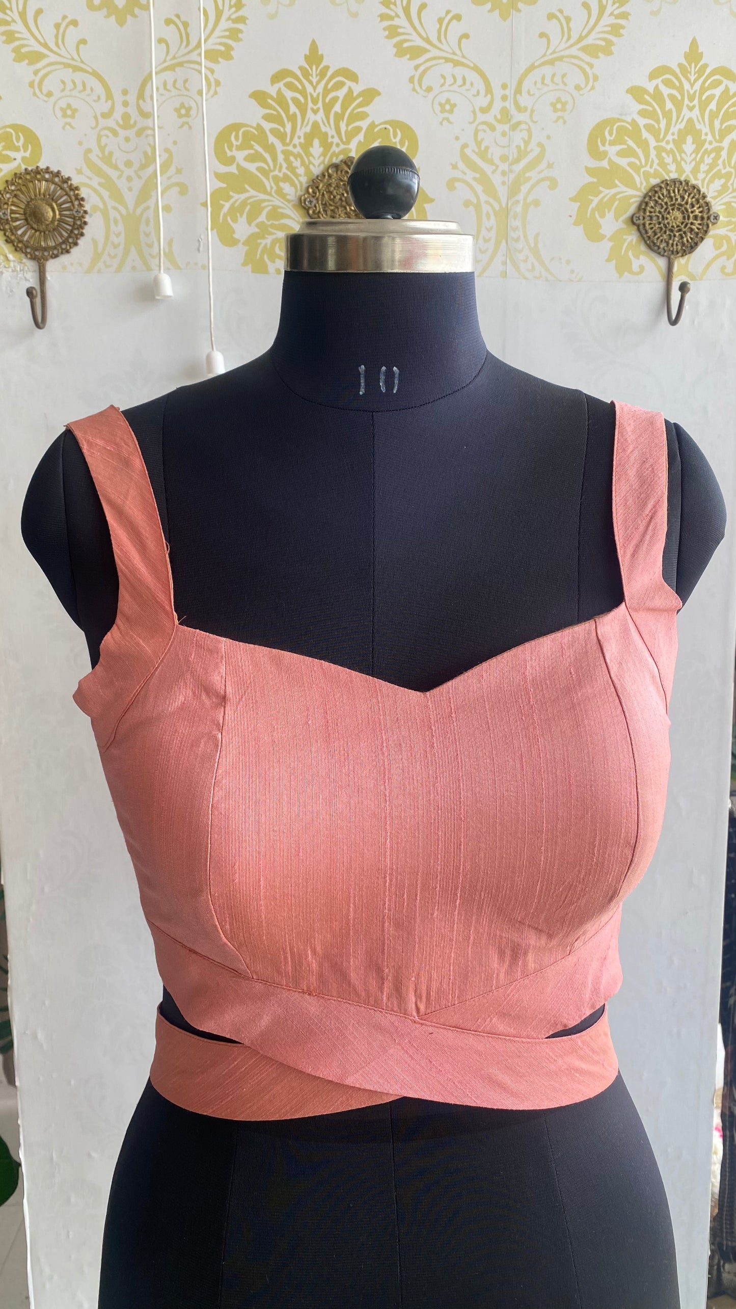 Peach silk waist band patterned blouse