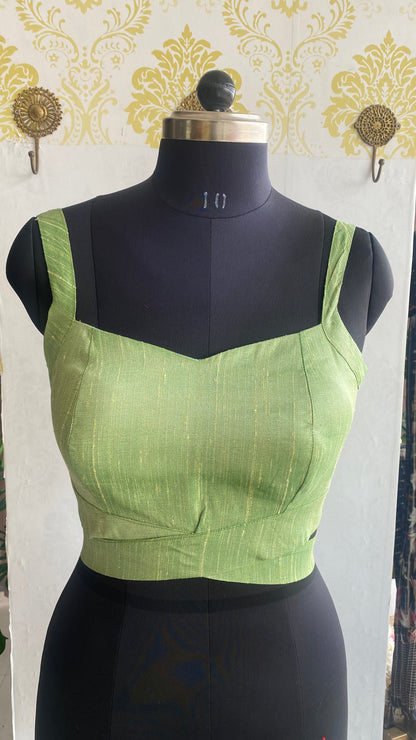 Pista green silk waist band patterned blouse