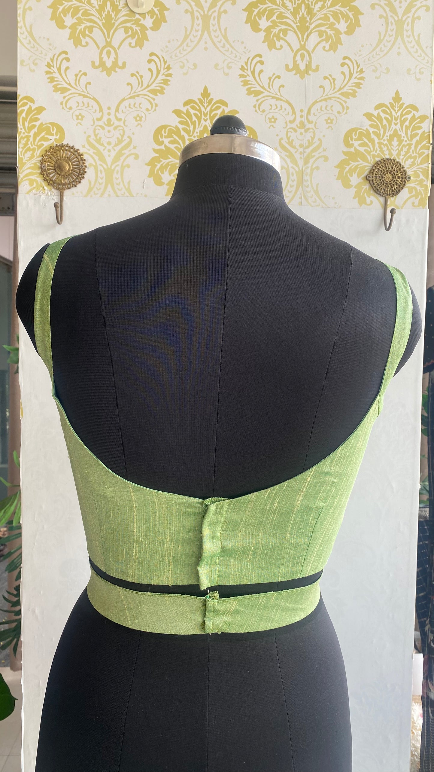 Pista green silk waist band patterned blouse