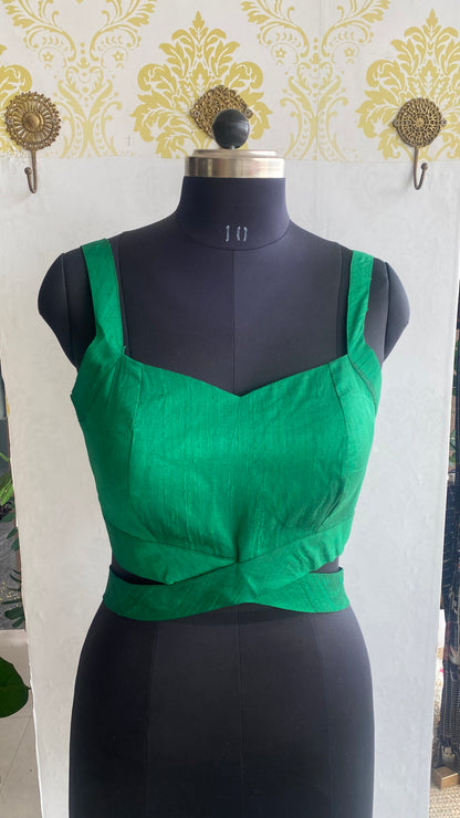 Green silk waist band patterned blouse