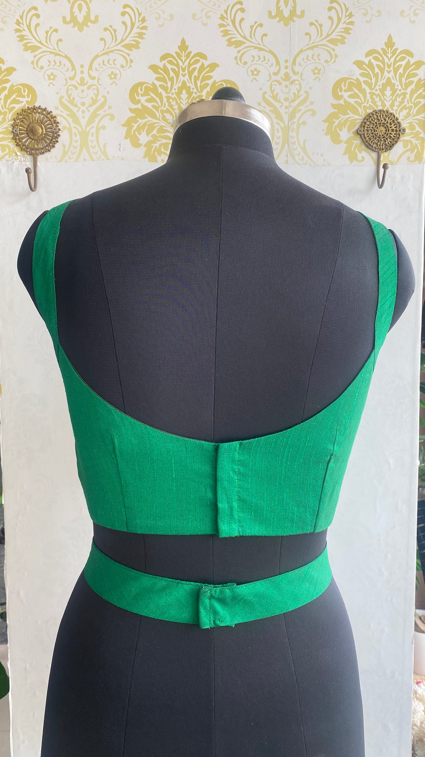 Green silk waist band patterned blouse