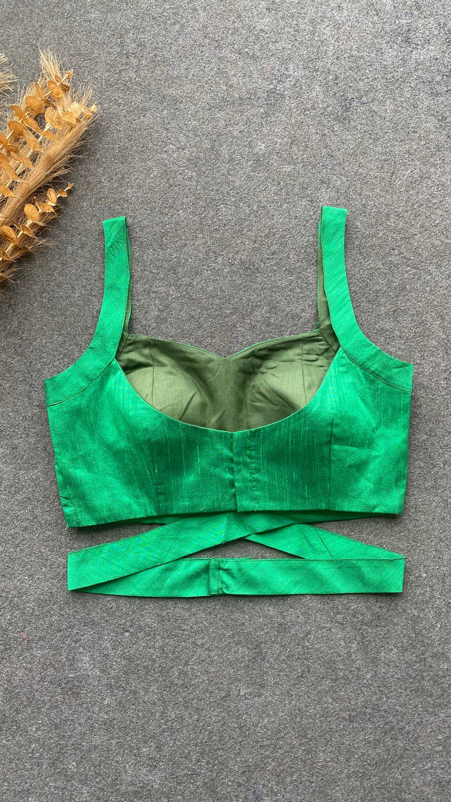 Green silk waist band patterned blouse