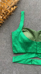 Green silk waist band patterned blouse