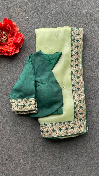 Mint organza embroidered saree with blouse