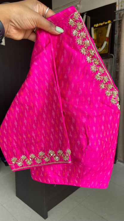 Black organza saree with pink ikkat blouse