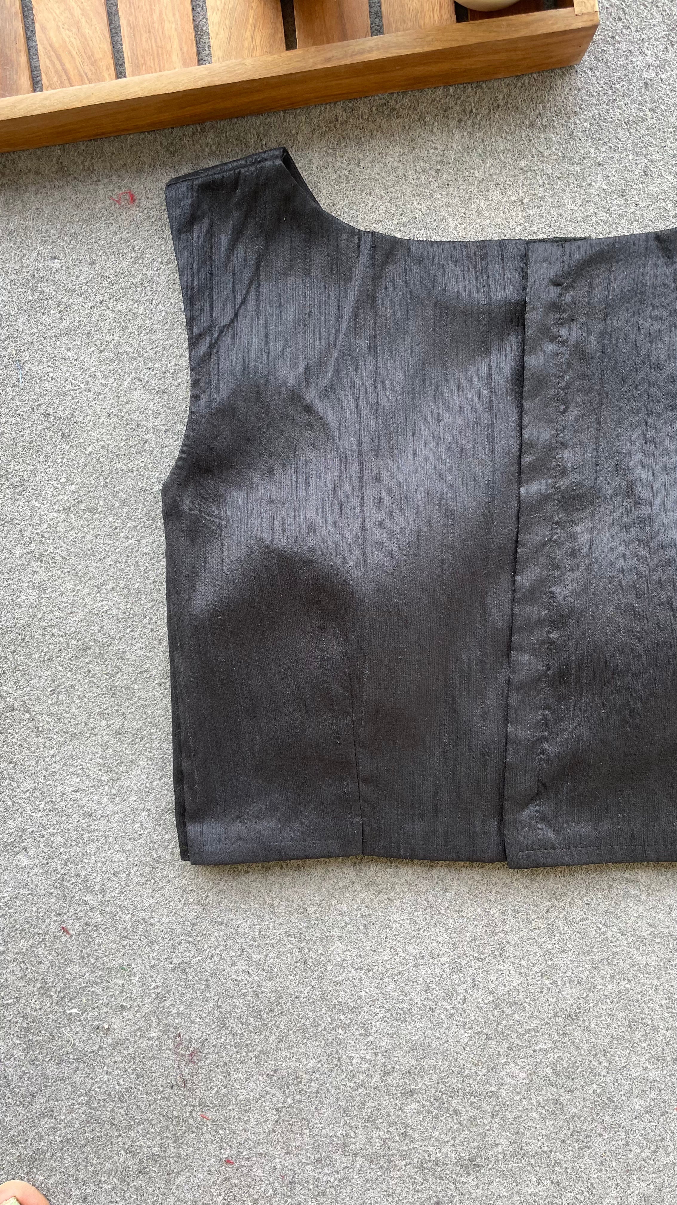 Black silk sleeveless blouse