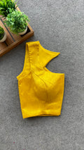 Yellow silk sleeveless blouse