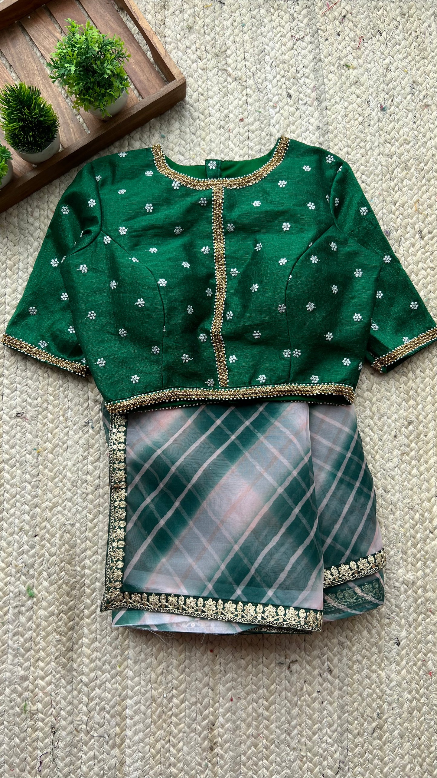 Green checked organza saree with embroidery work blouse