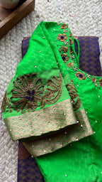 Deep purple and green silk saree with hand worked blouse