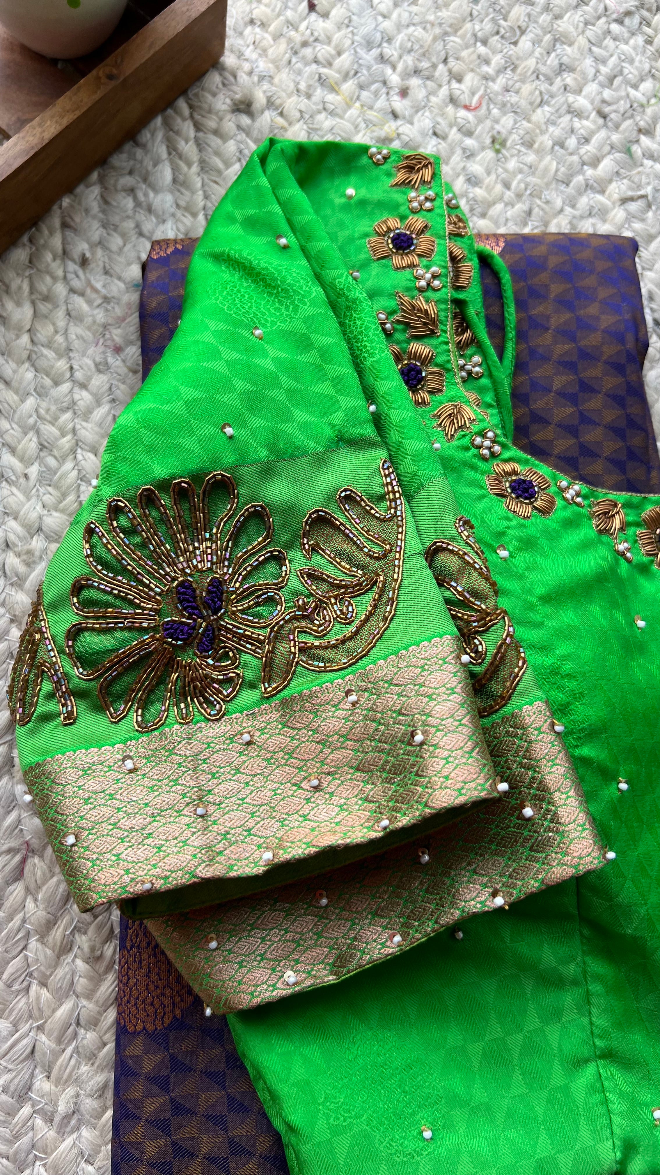 Deep purple and green silk saree with hand worked blouse