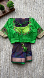 Deep purple and green silk saree with hand worked blouse