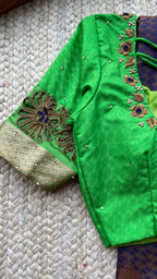 Deep purple and green silk saree with hand worked blouse