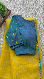Yellow organza checked saree with handwork blouse