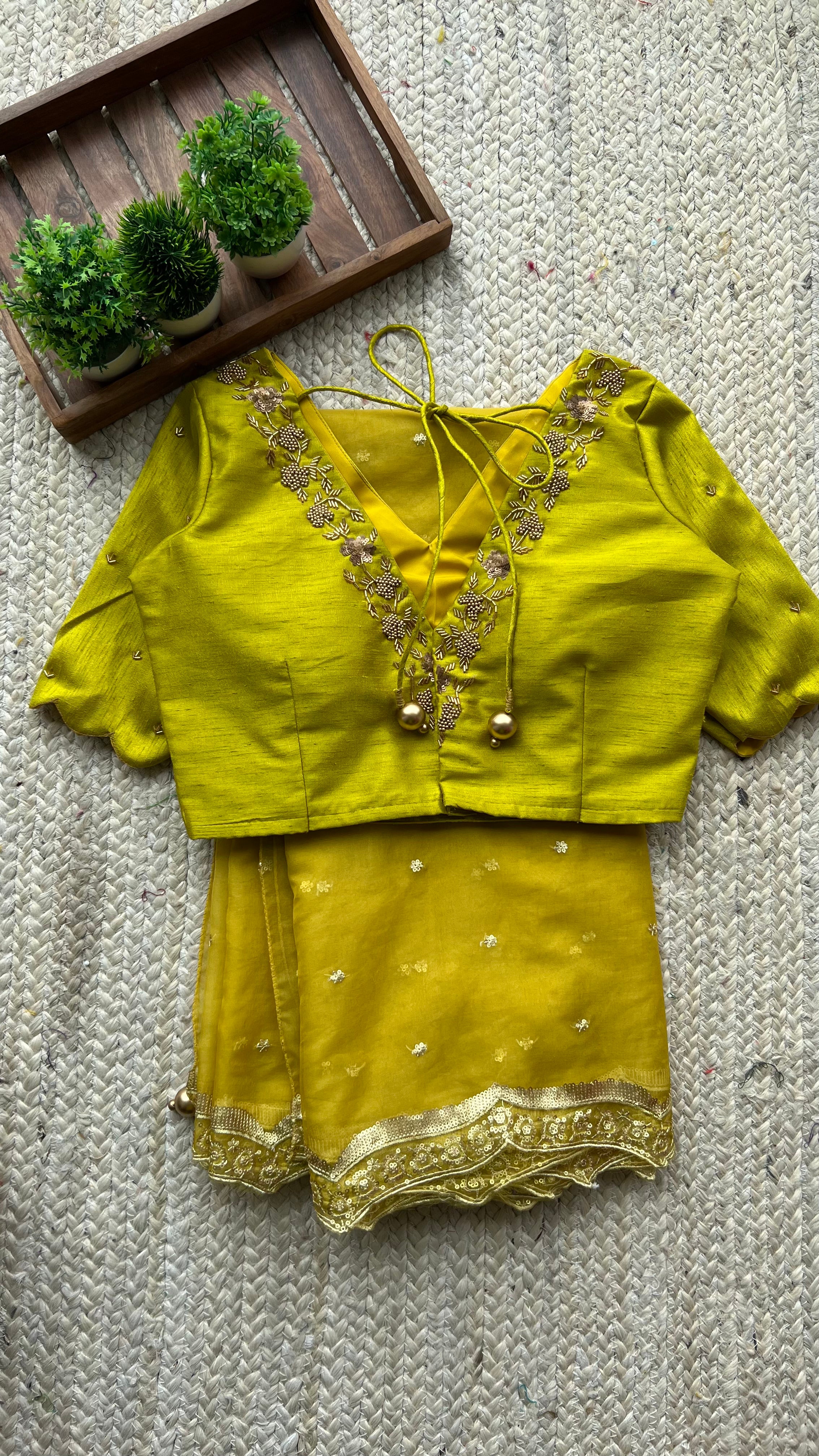 Yellow silk V neck hand worked blouse