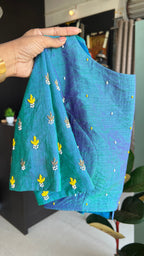 Yellow organza checked saree with handwork blouse