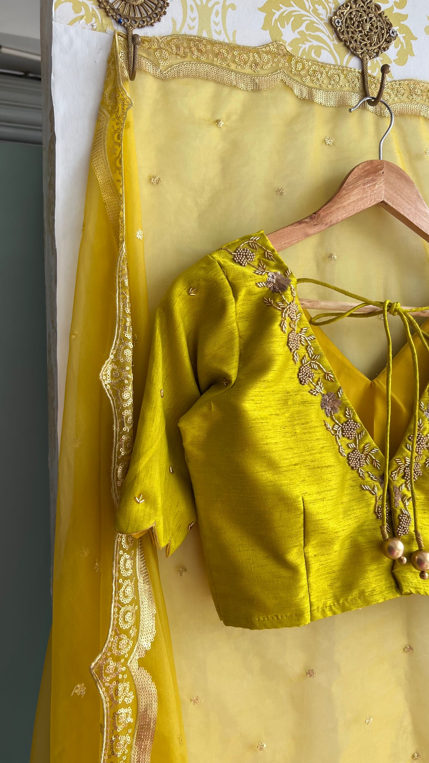 Yellow silk V neck hand worked blouse