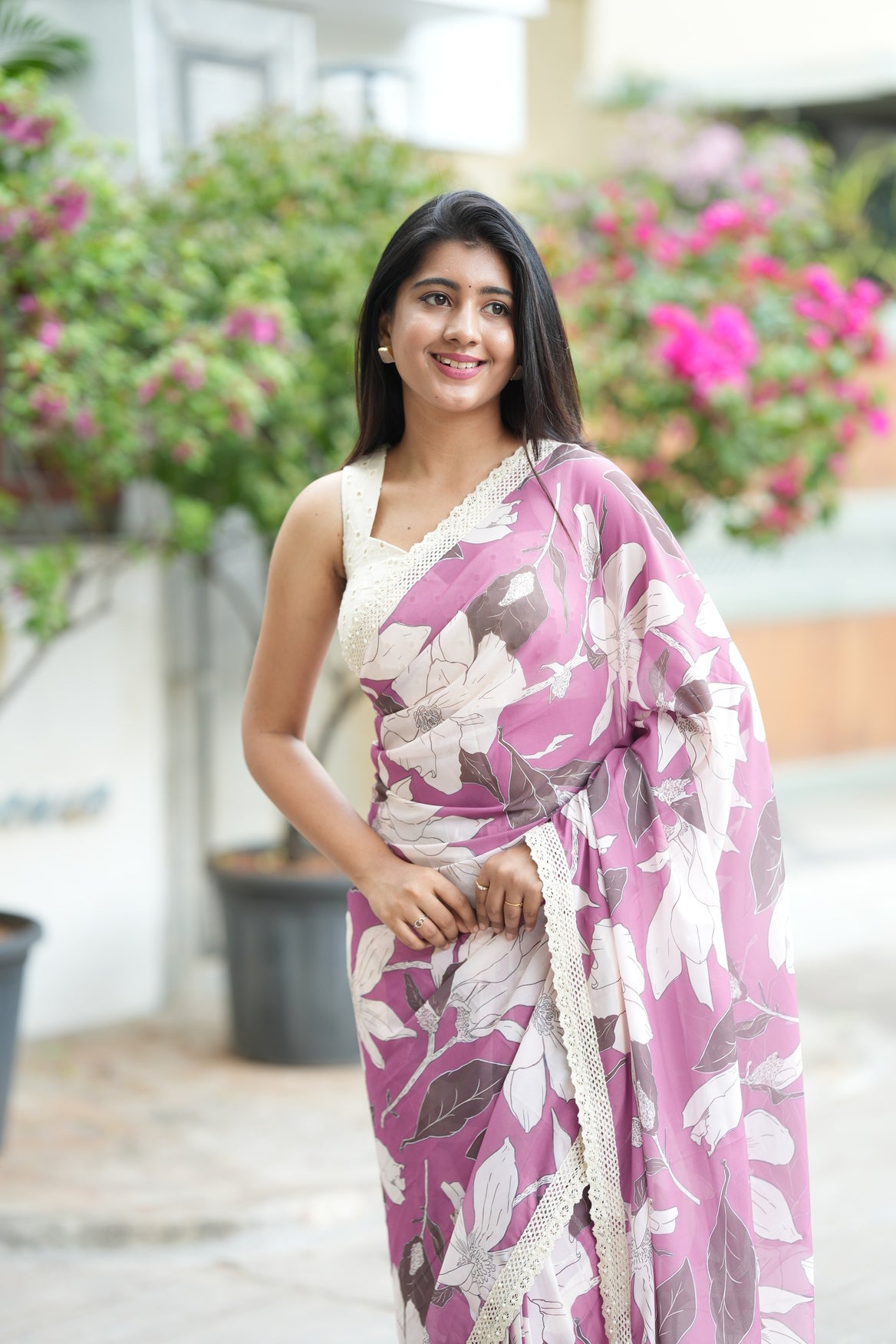 Lilac pink georgette saree with white embroidery blouse