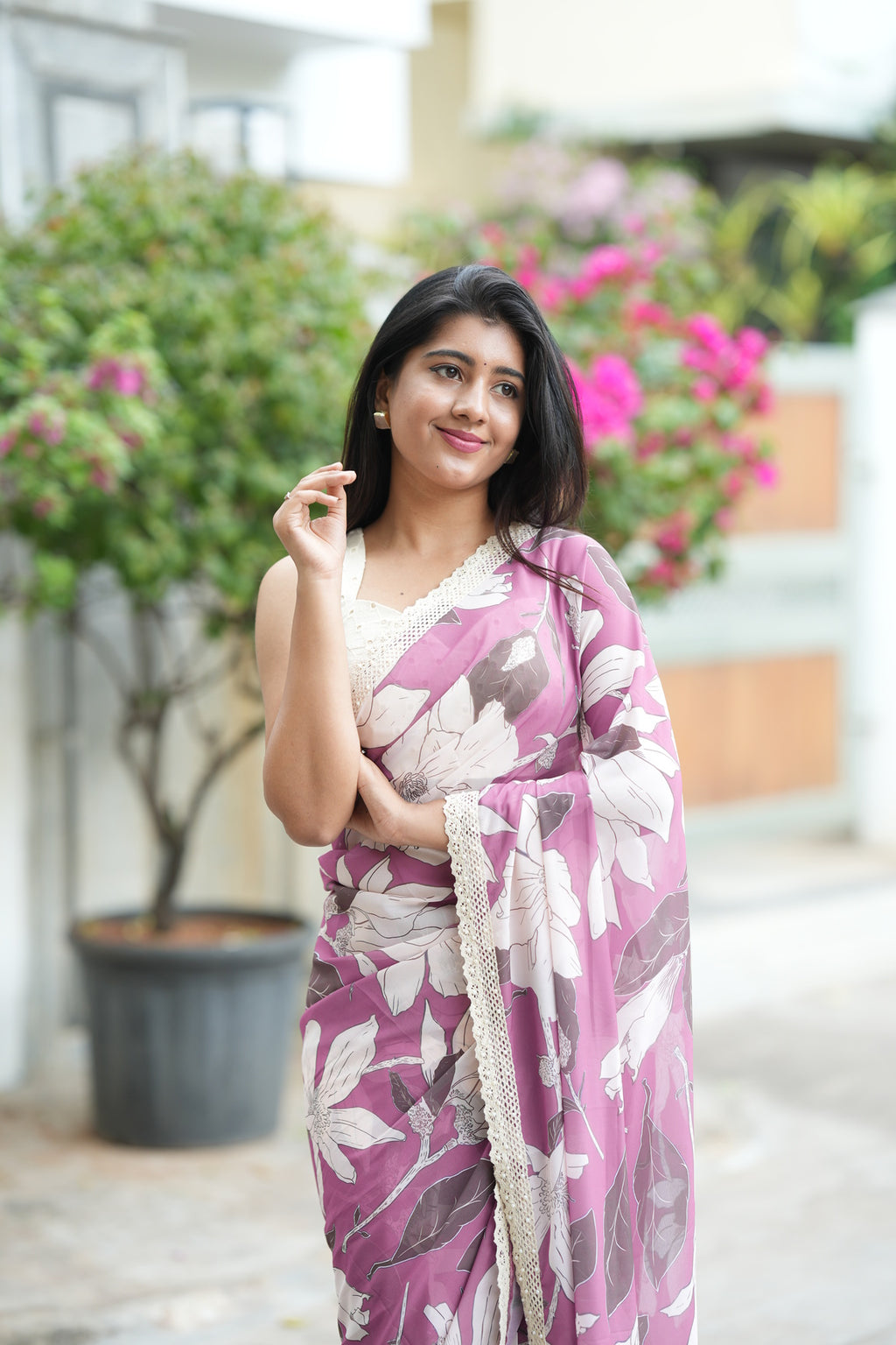 Lilac pink georgette saree with white embroidery blouse