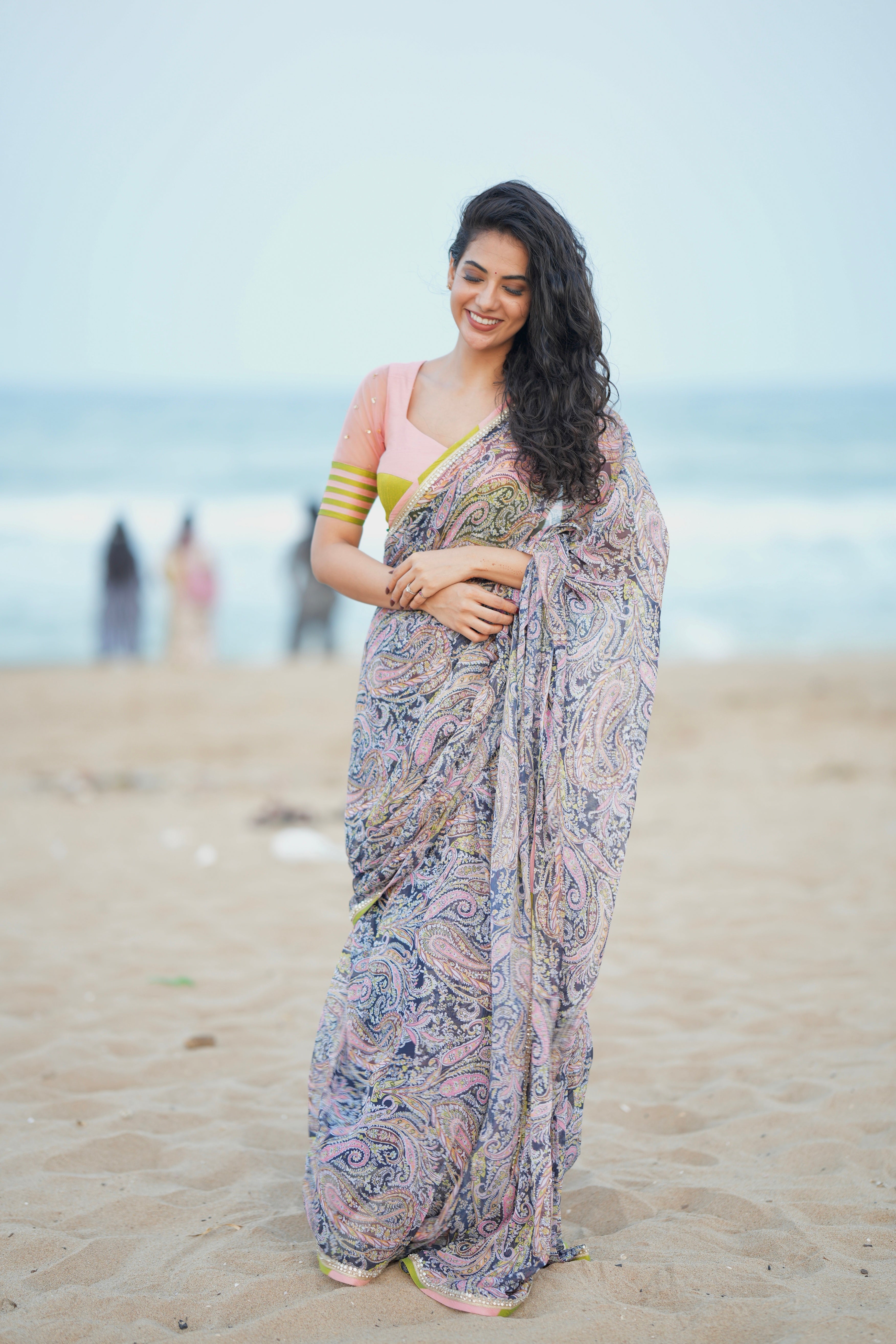 Midnight blue paisleys chiffon saree with hand worked blouse