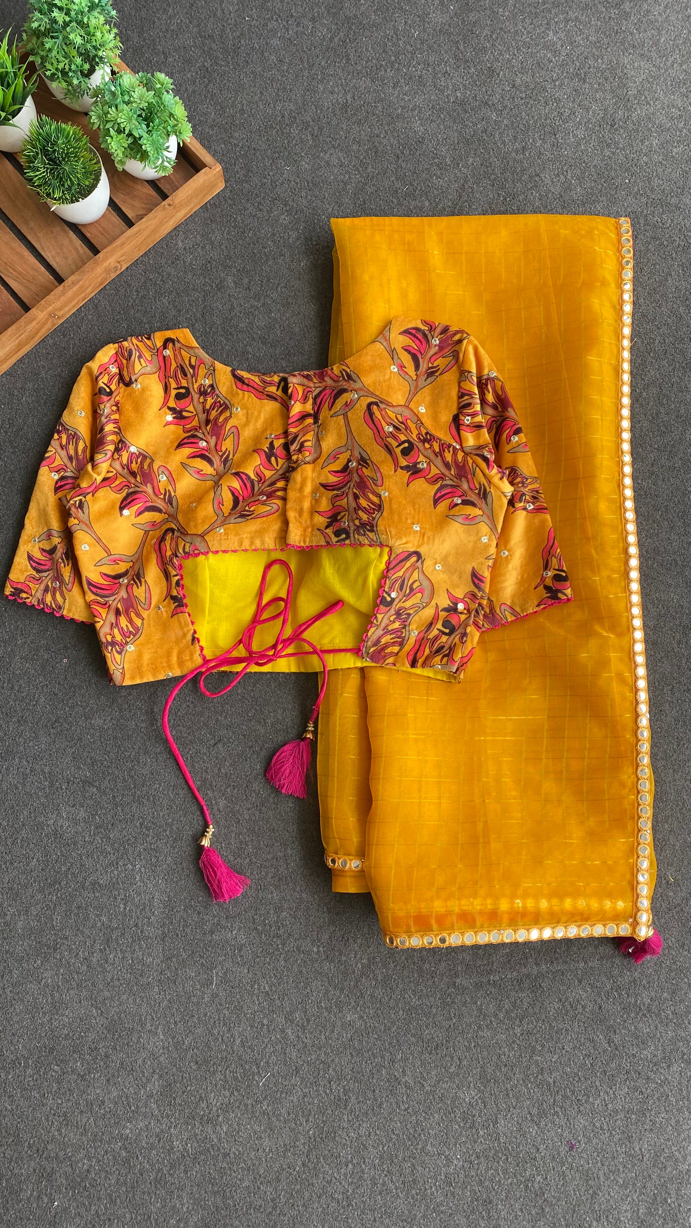 Yellow checked organza saree with velvet embroidery blouse