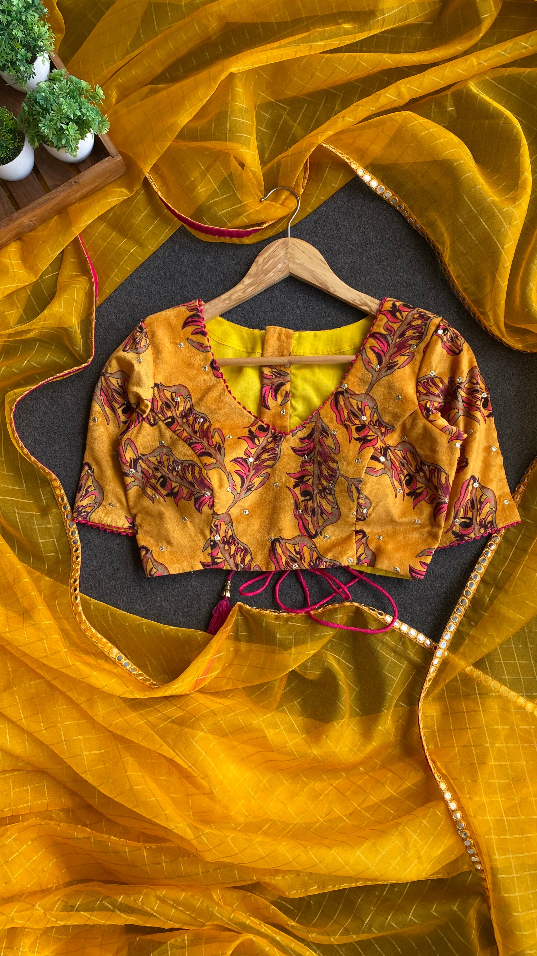 Yellow checked organza saree with velvet embroidery blouse