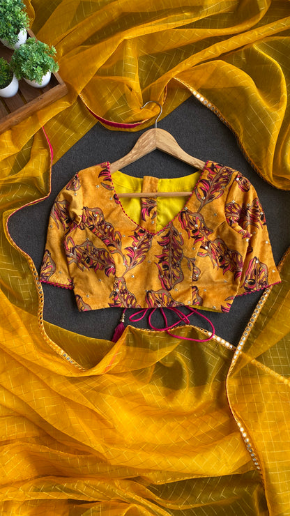 Yellow checked organza saree with velvet embroidery blouse