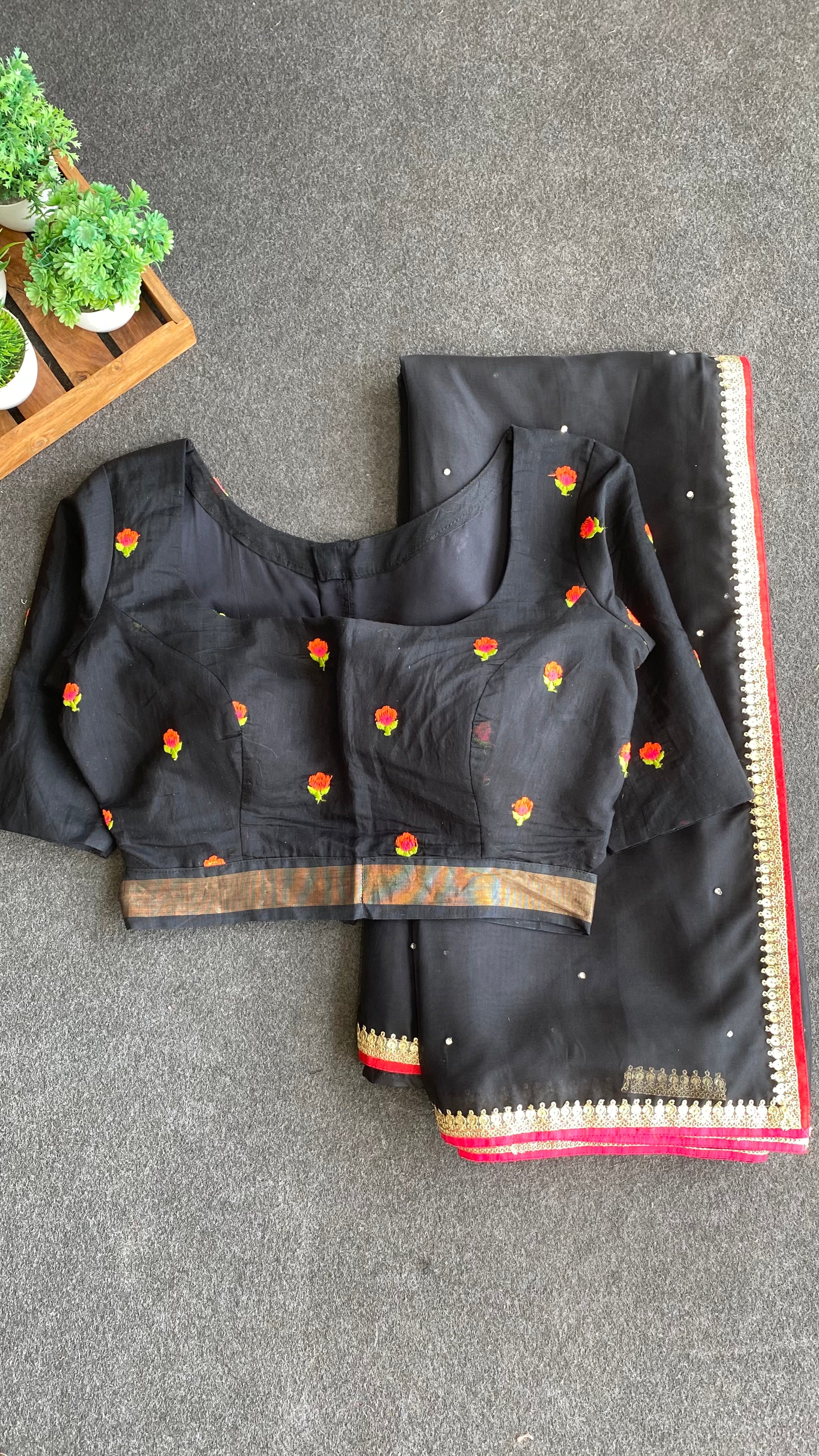 Black organza saree with black embroidery blouse