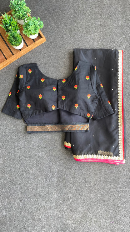 Black organza saree with black embroidery blouse
