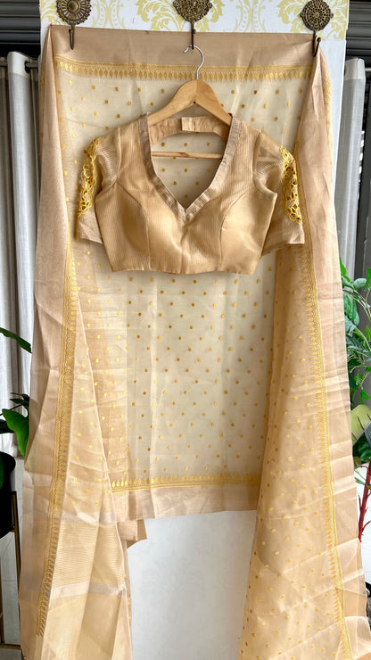 Gold kota doria saree with hand worked blouse