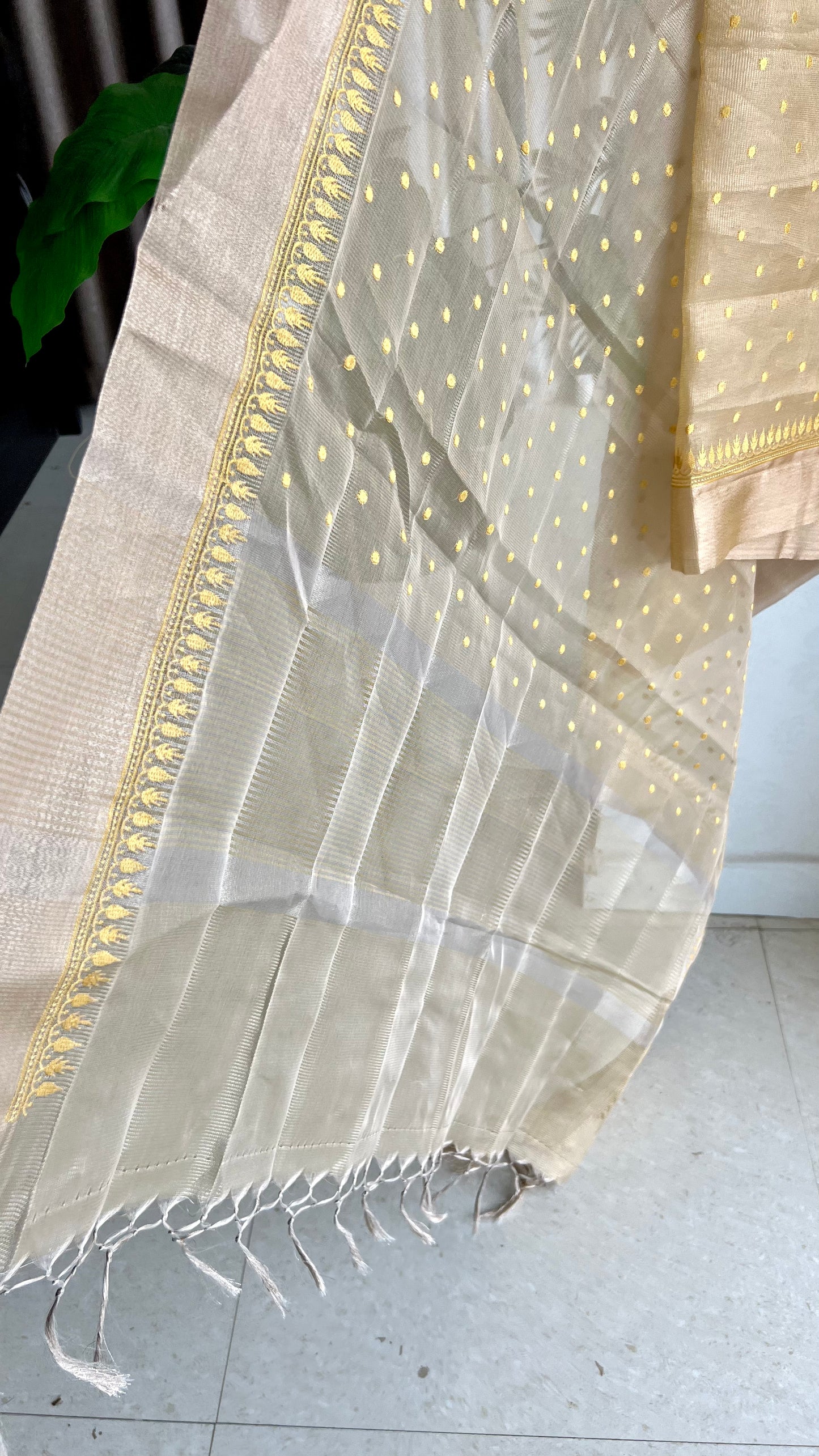 Gold kota doria saree with hand worked blouse