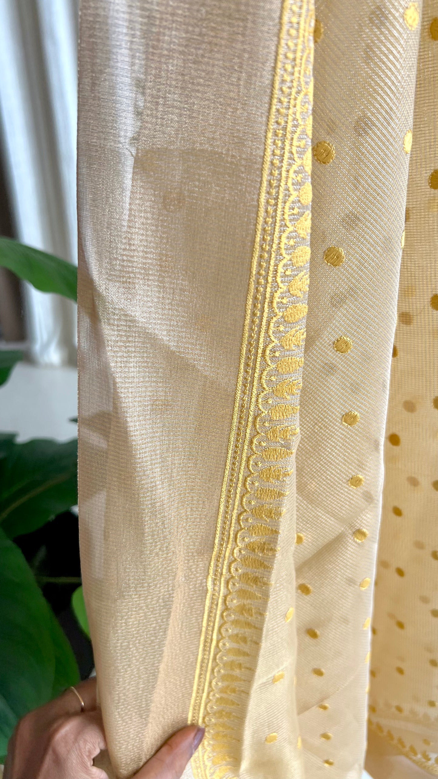 Gold kota doria saree with hand worked blouse