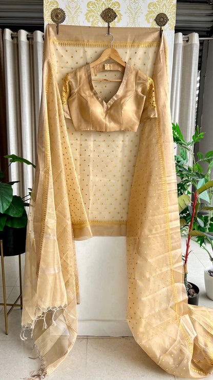 Gold kota doria saree with hand worked blouse