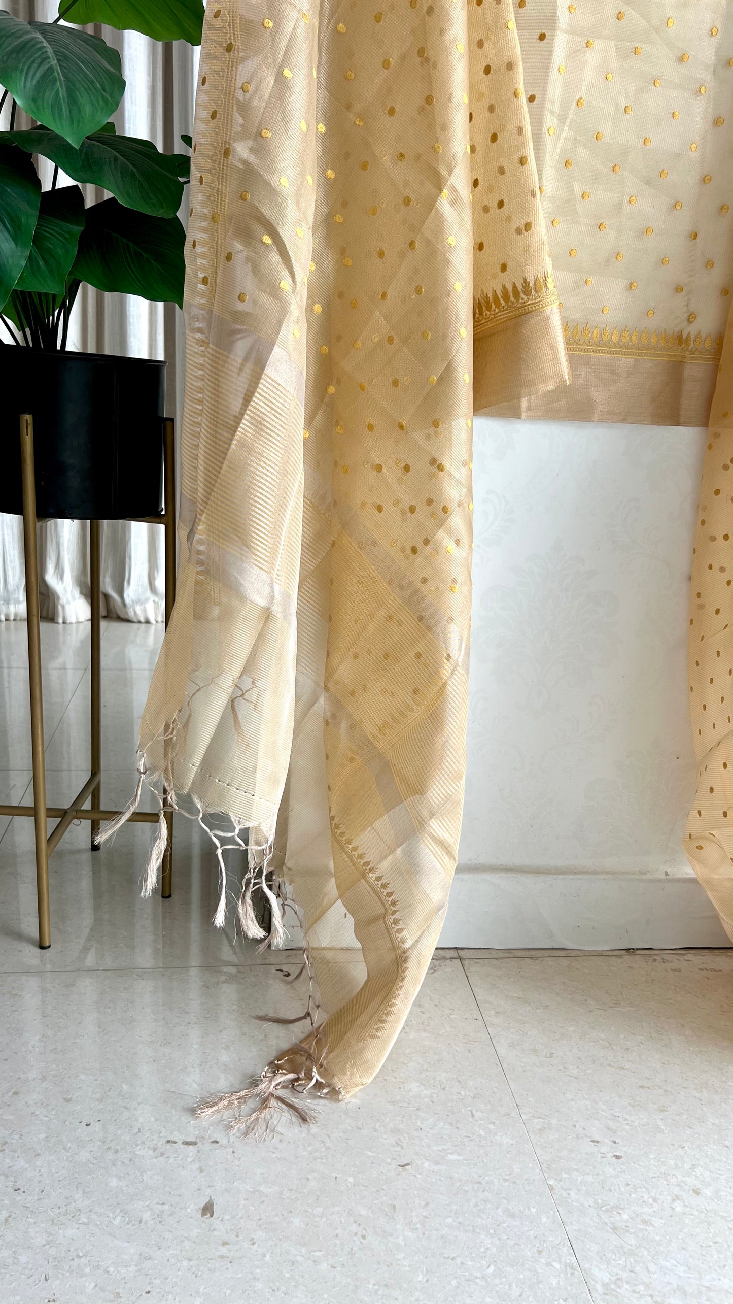 Gold kota doria saree with hand worked blouse