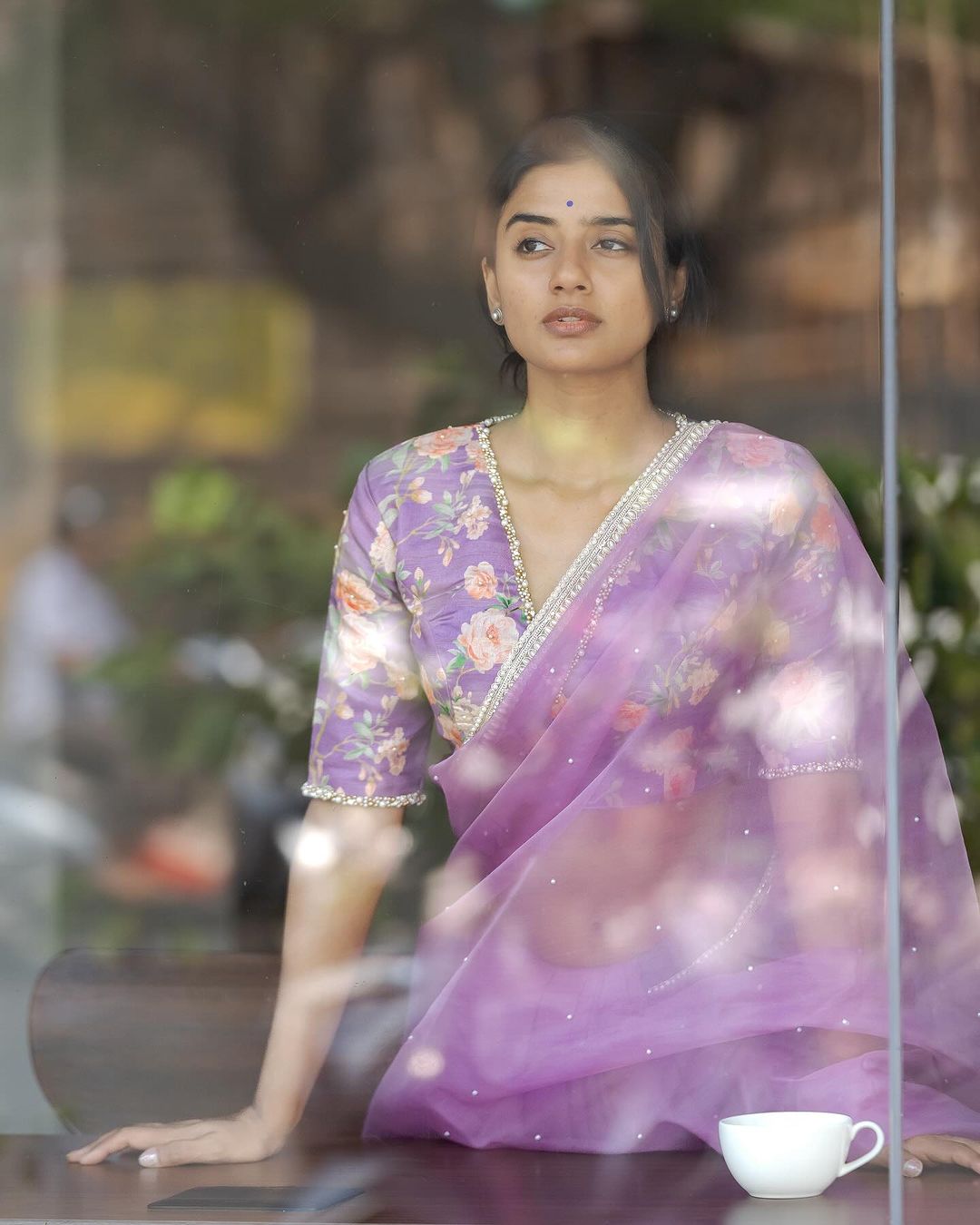 Lavender organza saree with pearl hand work blouse