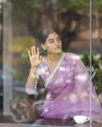 Lavender organza saree with pearl hand work blouse
