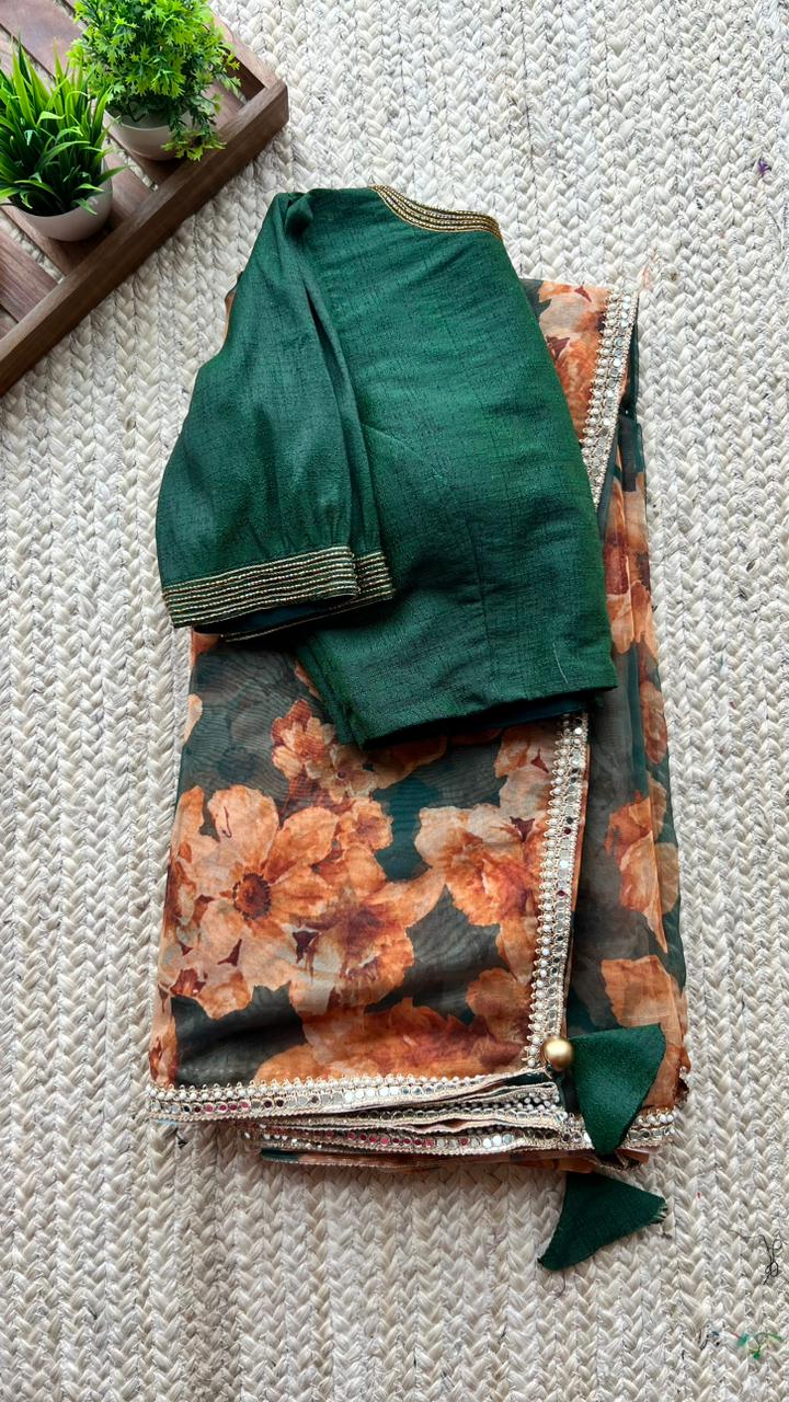 Bottle green floral organza saree with hand worked blouse