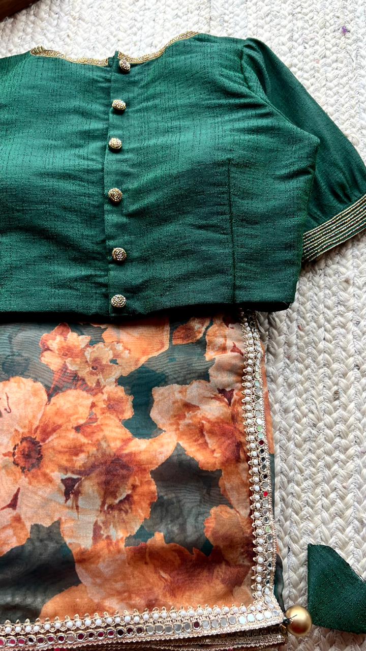 Bottle green floral organza saree with hand worked blouse