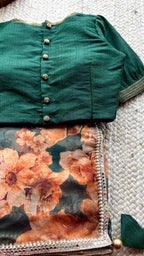 Bottle green floral organza saree with hand worked blouse