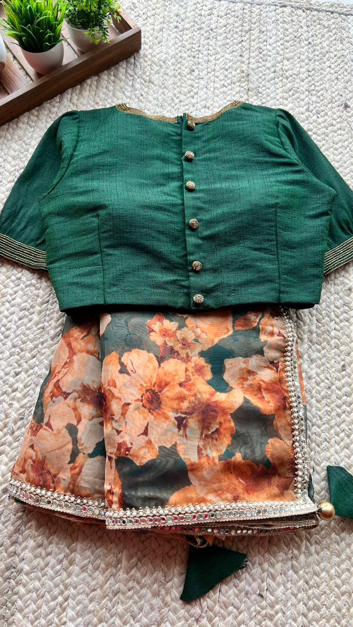 Bottle green floral organza saree with hand worked blouse