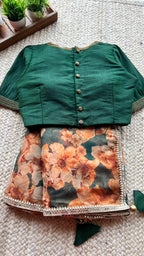 Bottle green floral organza saree with hand worked blouse