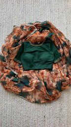 Bottle green floral organza saree with hand worked blouse