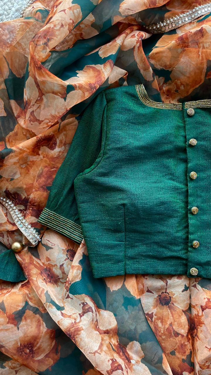 Bottle green floral organza saree with hand worked blouse