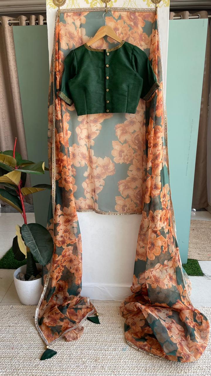 Bottle green floral organza saree with hand worked blouse